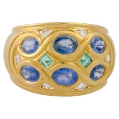 Ring with 6 Buff Top Cut Sapphires
