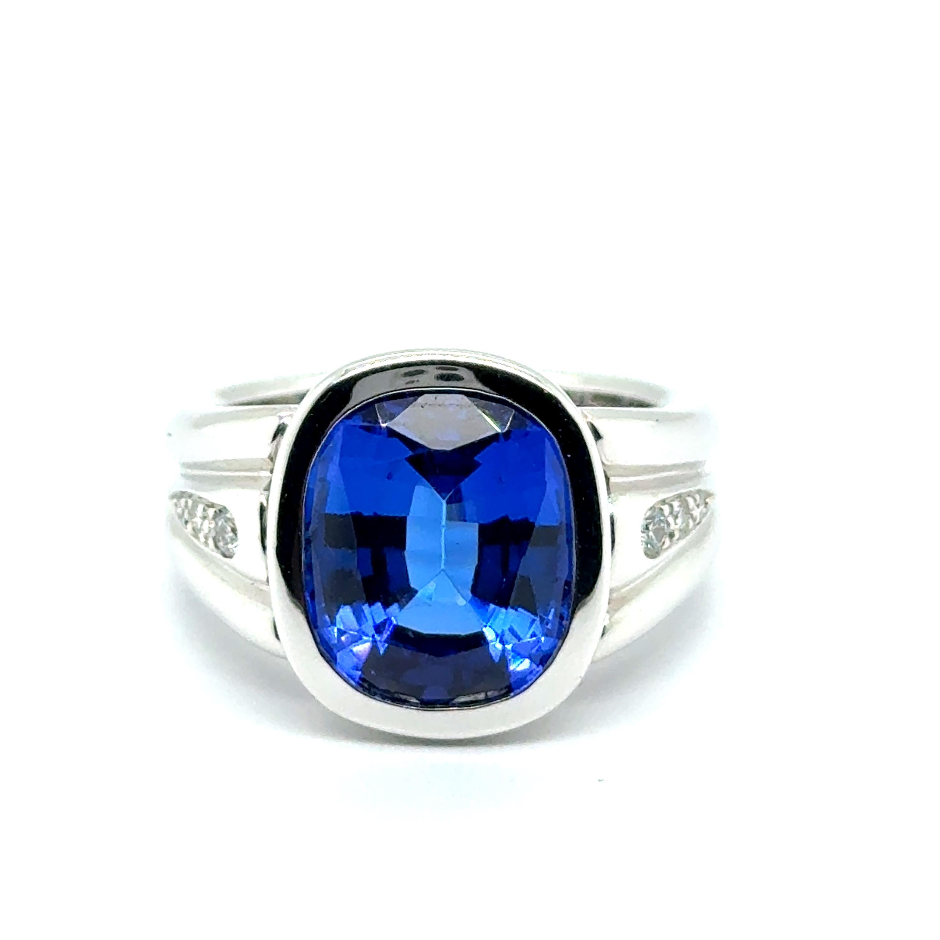 Ring mit 7,01 Karat Tansanit mit Diamanten aus 18 Karat Weißgold im Angebot 7