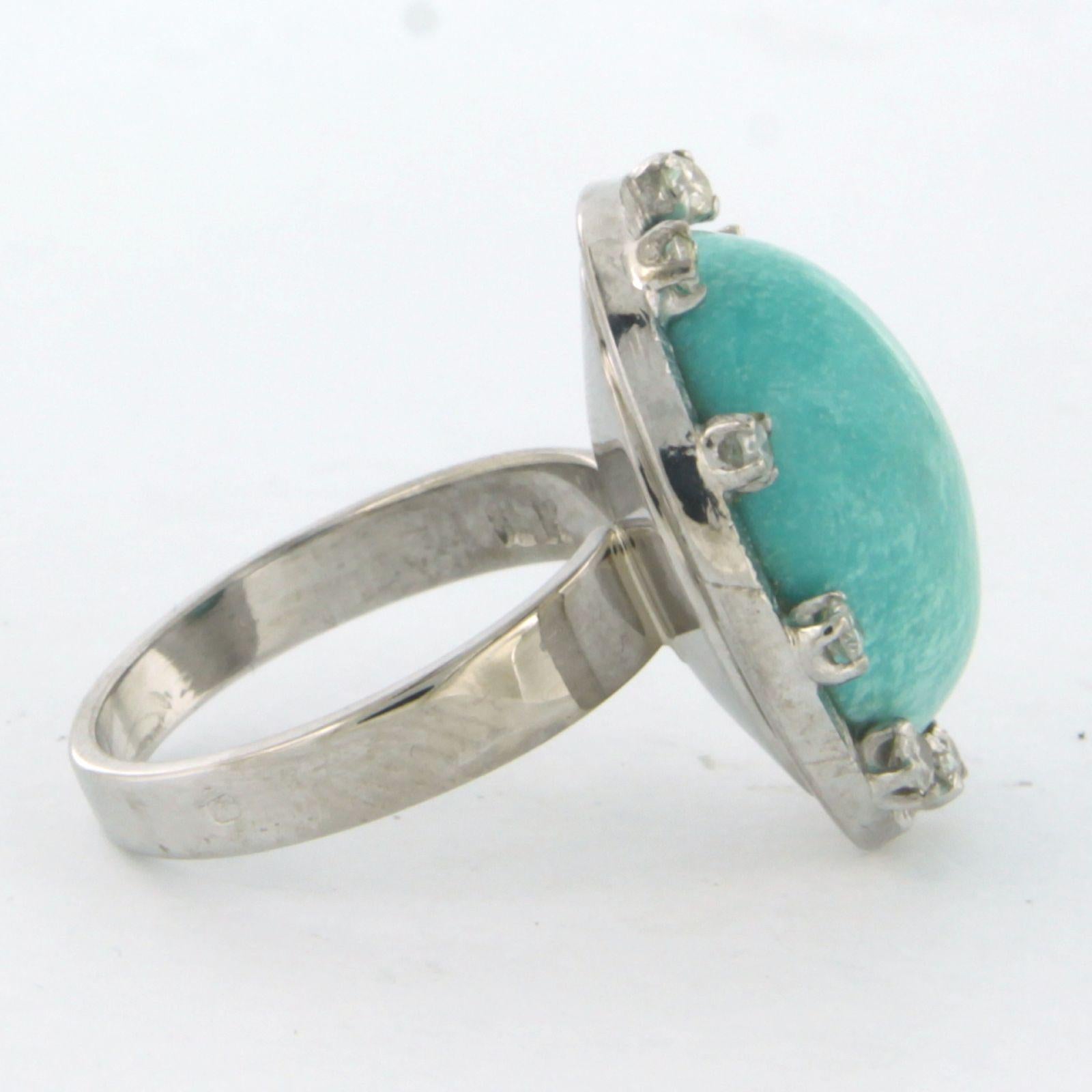 18 kt white gold ring set with amazonite and single cut diamonds 0.18ct - F/G - VS/SI - ring size U.S. 4.25 - EU. 14.75(46.5)

top of the ring is 1.9 cm wide by 9.0 mm high

weight 7.2 grams

ring size U.S. 4.25 - EU. 14.75(46.5), We can resize a