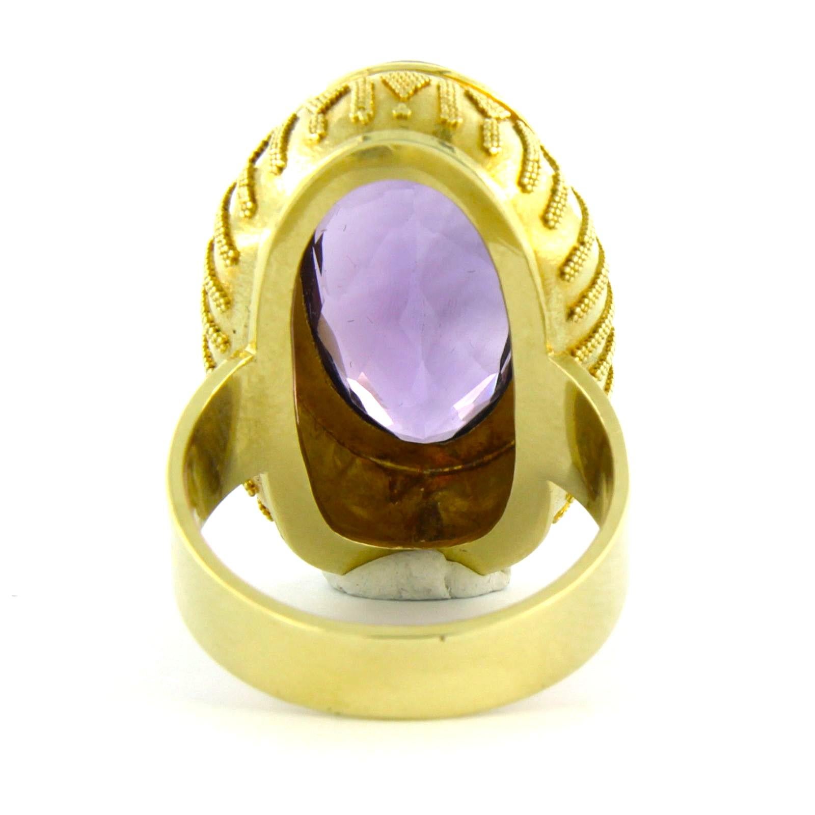 Oval Cut Ring with amethyst 12.8 grams 14k yellow gold For Sale