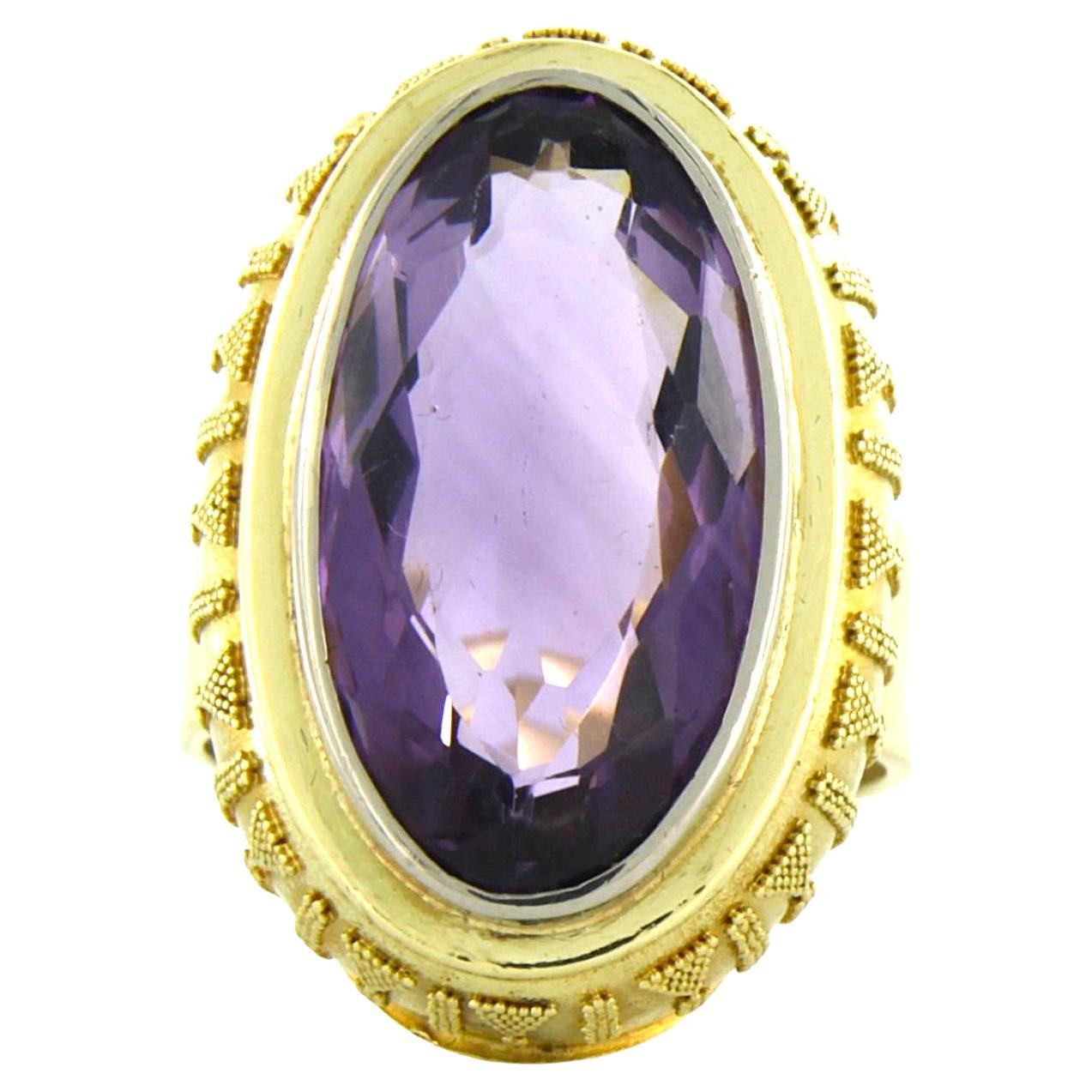 Ring with amethyst 12.8 grams 14k yellow gold