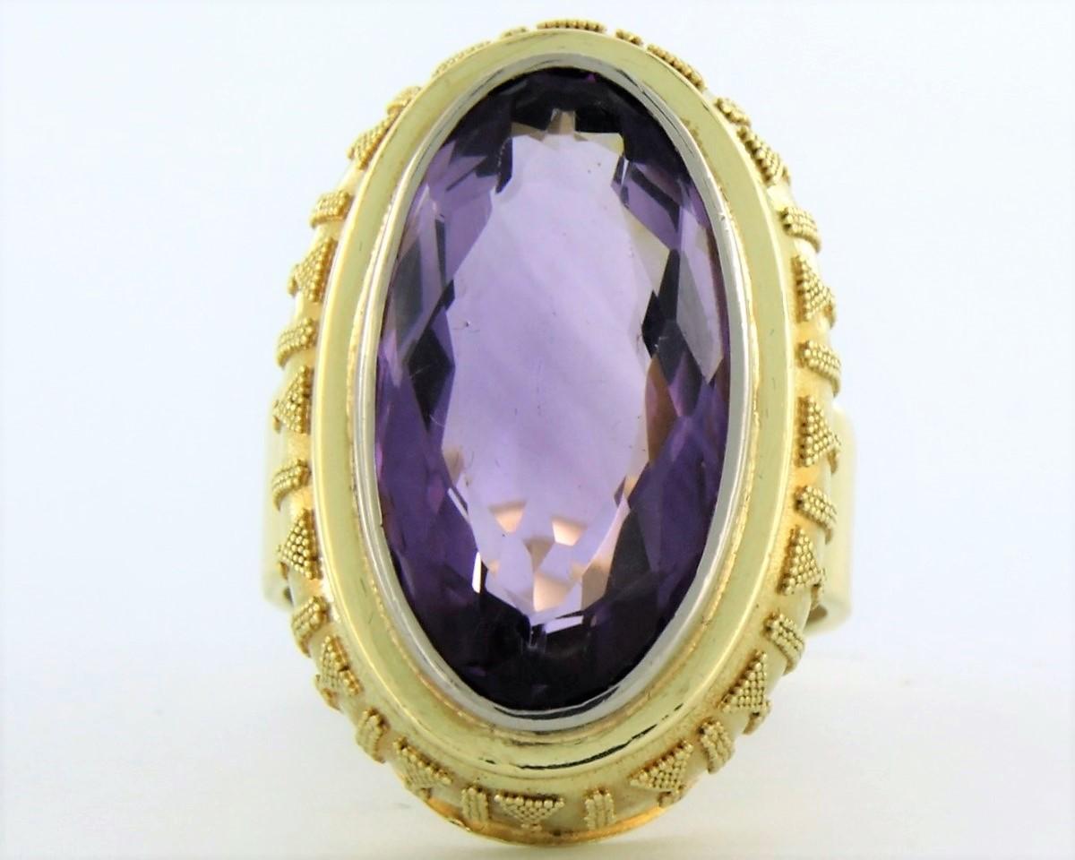 14k yellow gold ring set with amethyst - ring size US. 7.75 - EU 17.75(56)

detailed description:

the top of the ring is 2.7 cm wide by 9.4 mm high

weight 12.8 grams

ring size US 7.75 - EU 17.75(56), ring can be enlarged or reduced a few sizes at