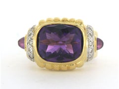 Anillo con amatista y diamantes talla brillante de hasta 0,20 ct 15,0 gramos Oro de 18k
