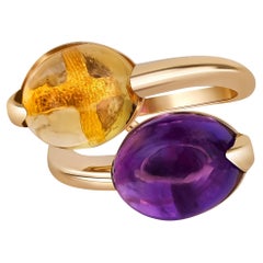 Anello con cabochon di ametista e citrino