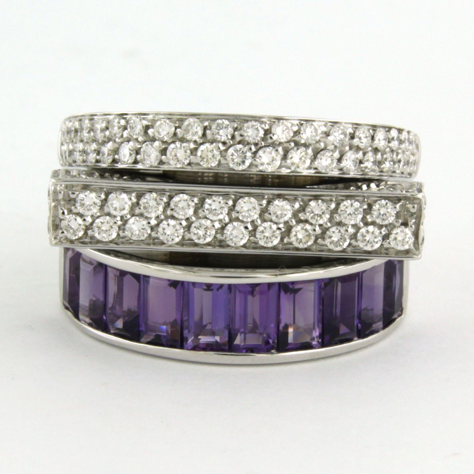 18k white gold ring set with amethyst and brilliant cut diamond. 1.80ct - F/G - VS/SI - ring size U.S. 7 – EU. 17.25(54)

detailed description:

The top of the ring is 1.6 cm wide by 6.7 mm high

Ring size US 7 – EU. 17.25(54), ring can be enlarged