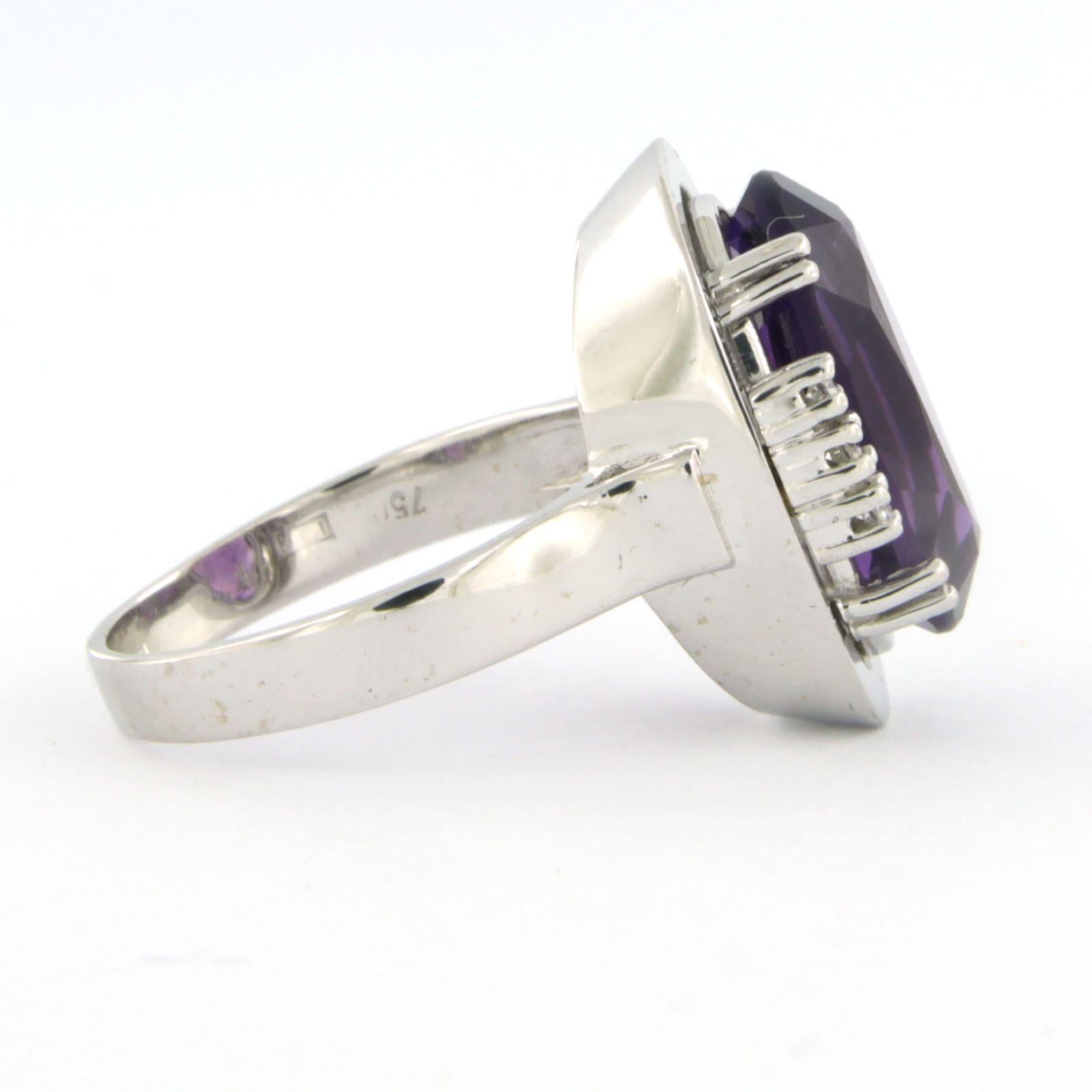 Bague en or blanc 18k sertie d'une améthyste et d'un diamant taille unique. 0.12ct - F/G - VS/SI - taille U.S. 8 - EU. 18.25(57)

description détaillée :

La partie supérieure de l'anneau est de forme ovale et mesure 2,0 cm sur 1,4 cm de large et