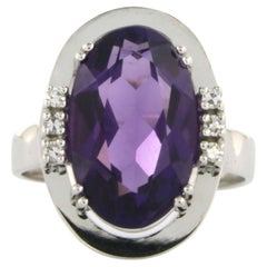 Ring with amethyst and single cut diamonds up to 0.12ct 18k gold 6.8 grams