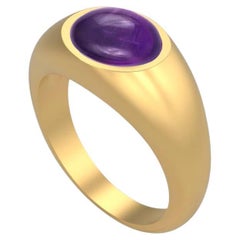 Ring with amethyst cabochon