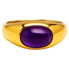 Ring with amethyst cabochon