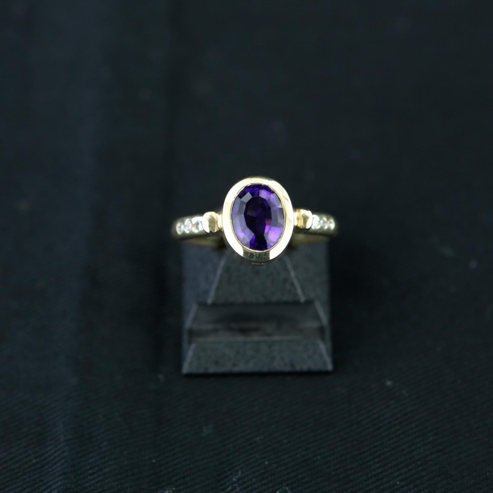 Gold Ring with amethyst stone and diamonds in 18 ct. gold For Sale