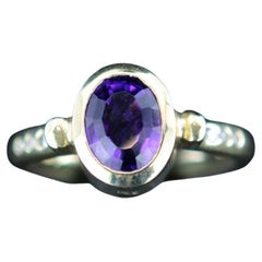 Ring with amethyst stone and diamonds in 18 ct. gold