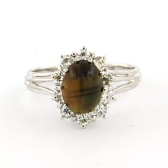 Ring with Tiger's Eye and brilliant diamonds up to 0.50ct 18k gold 3.3 grams