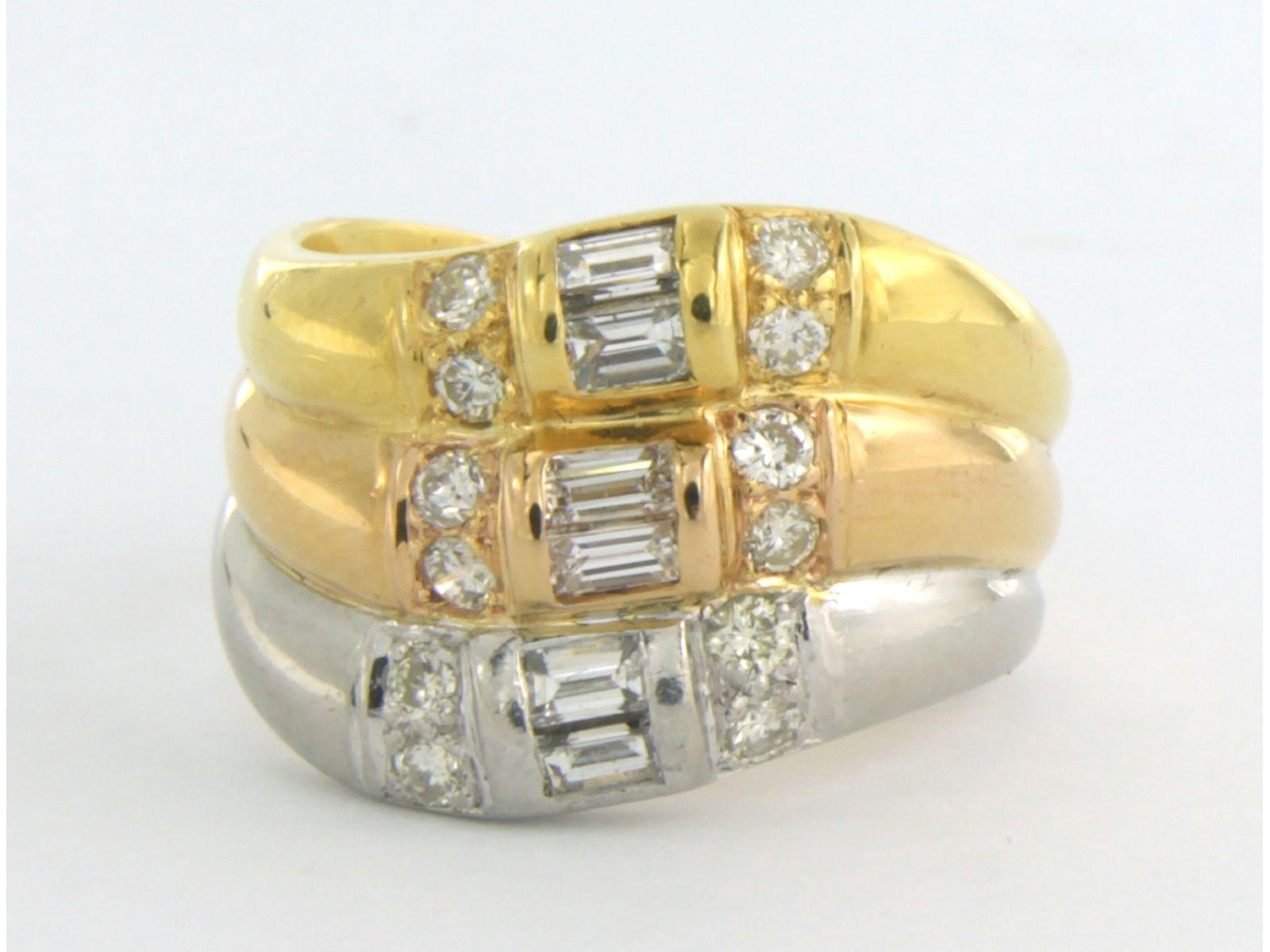 18k tricolour platinum and gold ring set with baguette and brilliant cut diamond up to 1.00ct - F/G- VS/SI - ring size US 7 - EU 17.5 (55)

detailed description:

the ring is approximately 1.5 cm wide

ring size US 7 - EU. 17.5 (55)

weight 11.5