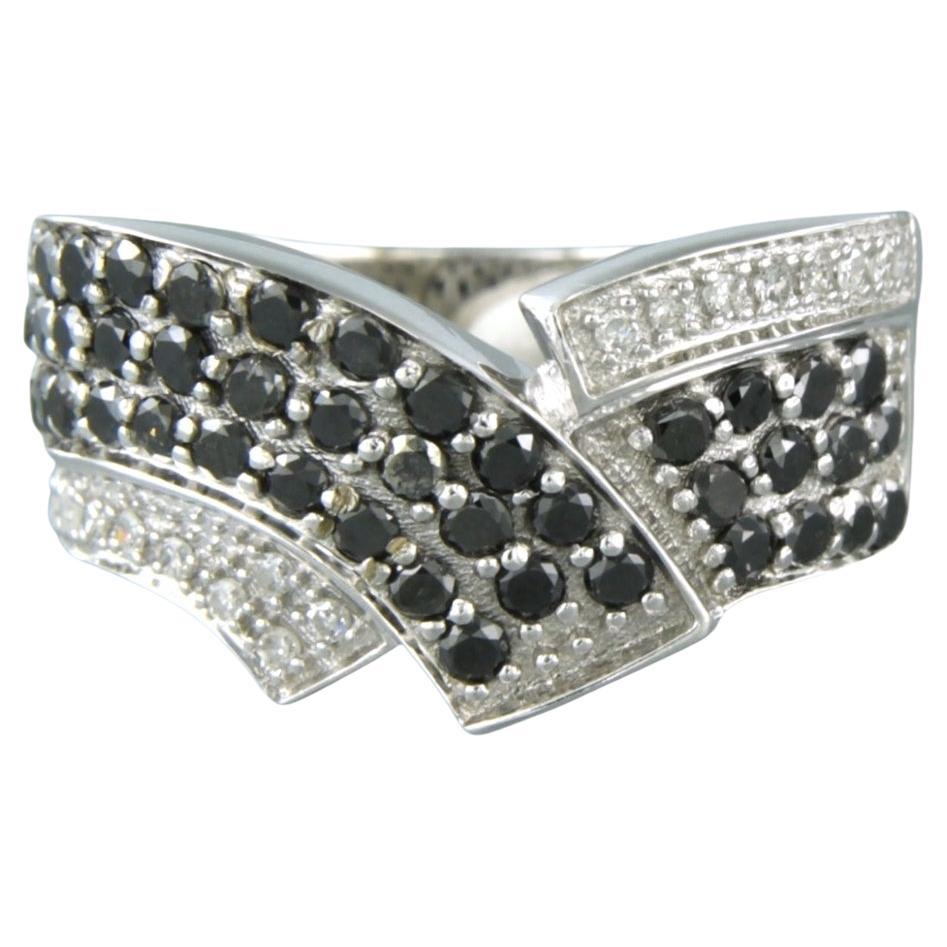 Ring with black diamonds and single cut diamonds up to 0.80ct 18k white gold