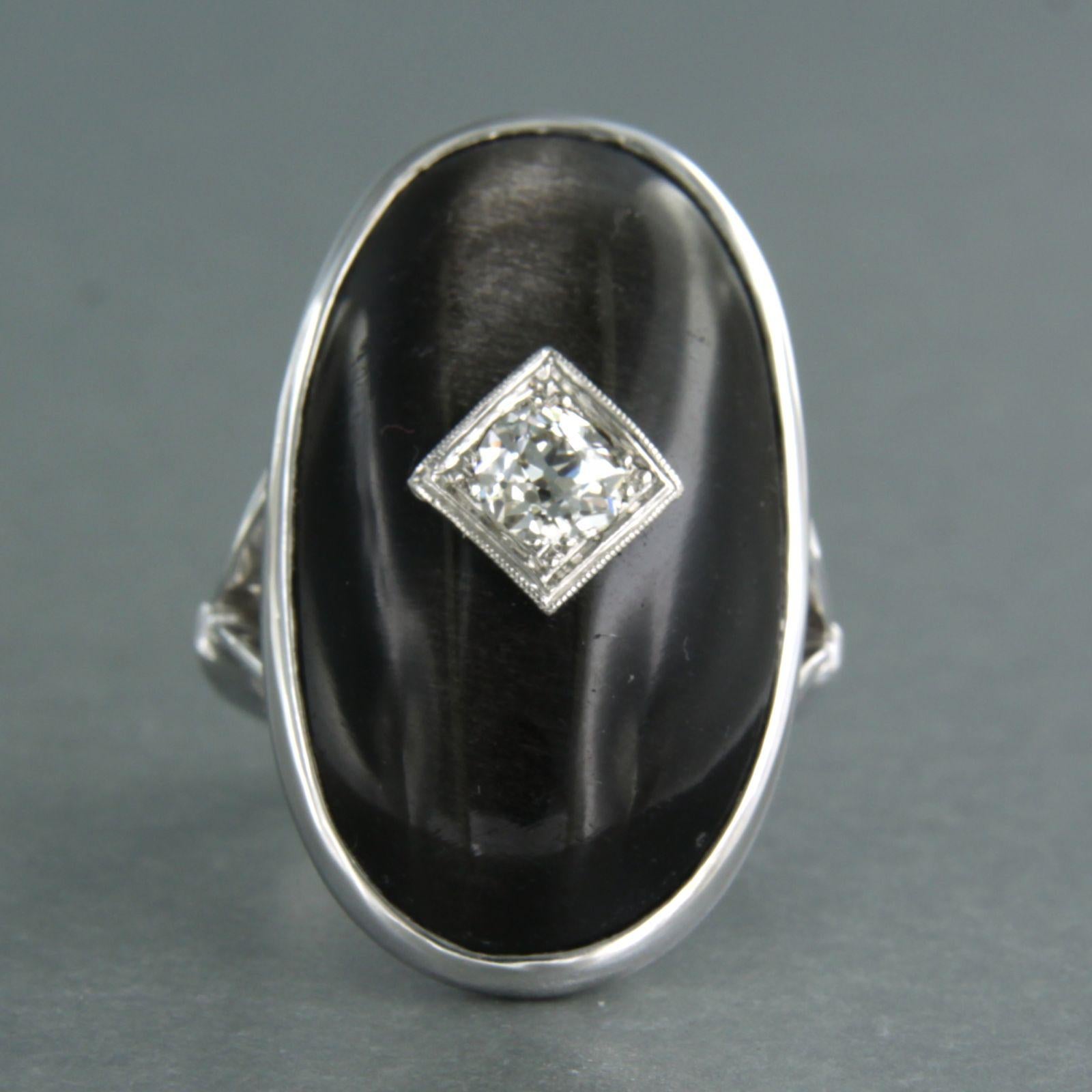14k white gold ring set with black star sapphire and old mine cut diamond up to 0.50ct - ring size US 6.5 - EU 17 (53)

detailed description:

the top of the ring is 3.1 cm wide by 9.5 mm high

weight 9.9 grams

ring size US 6.5 - EU 17 (53), ring