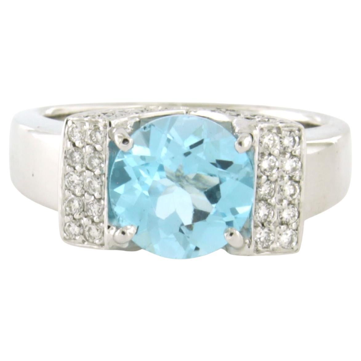Ring with blue topaz and brilliant cut diamonds up to 0.60ct 14k gold 11.0 grams