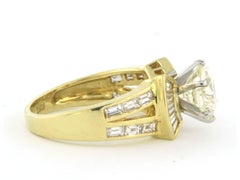 RIng with brilliant and baguette shaped diamonds up to 3.40ct 18k gold 6.7 grams
