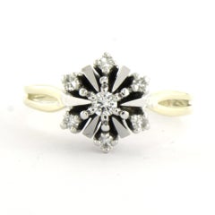 Bague sertie de diamants taille brillant et taille simple, d'un poids total maximal de 0,20 ct, en or 14 carats, 4,2 grammes