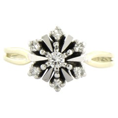 Bague sertie de diamants taille brillant et taille simple, d'un poids total maximal de 0,20 ct, en or 14 carats, 4,2 grammes