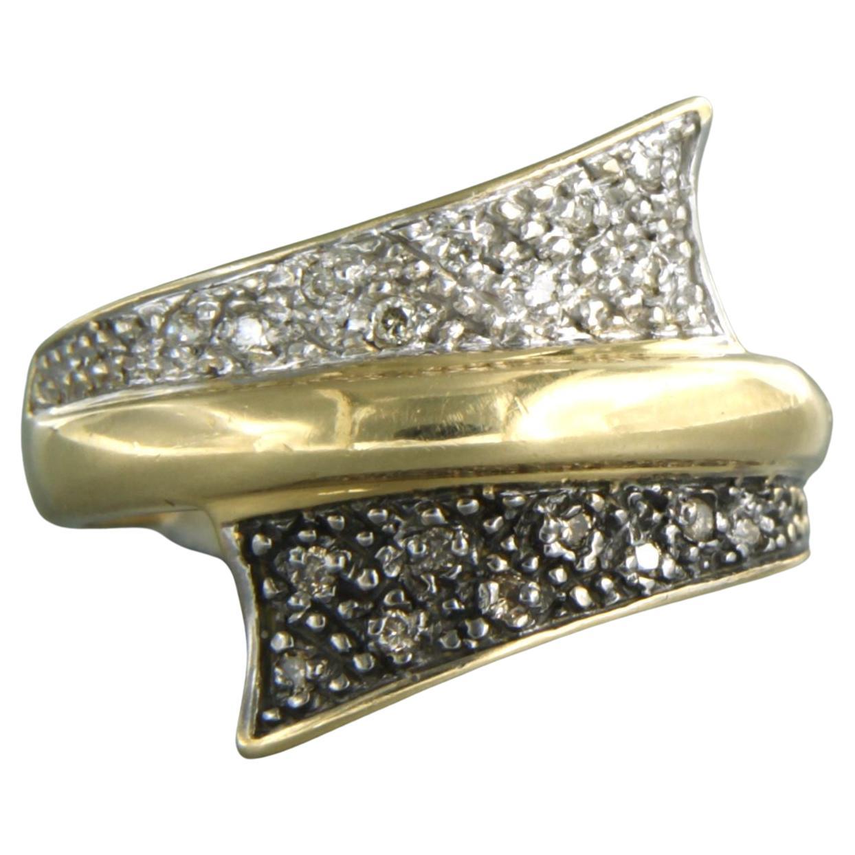 Anello  con diamanti a taglio brillante. 0,20ct oro giallo 18k