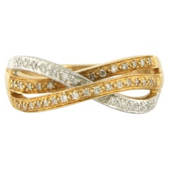 Ring with brilliant cut diamonds up to 0.30ct 18k bicolour gold 6.4 grams
