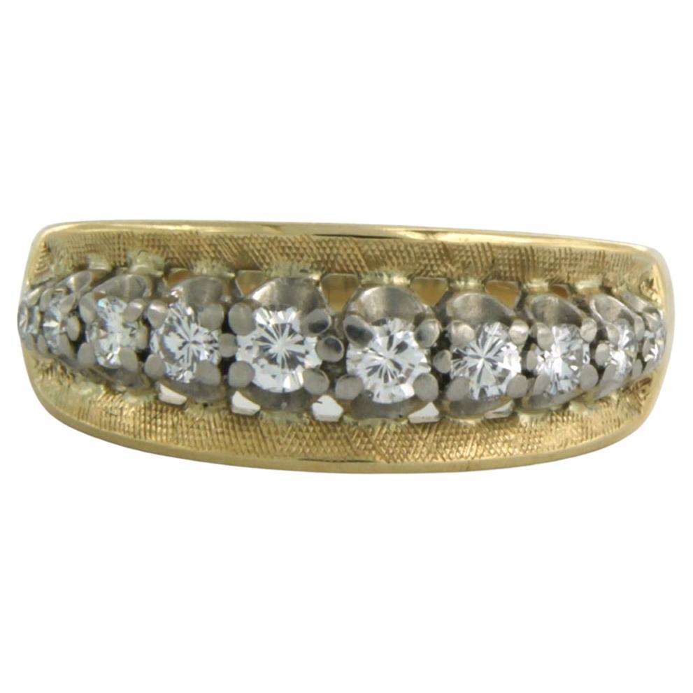 Ring with brilliant cut diamonds up to 0.30ct 18k bicolour gold
