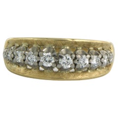 Ring with brilliant cut diamonds up to 0.30ct 18k bicolour gold