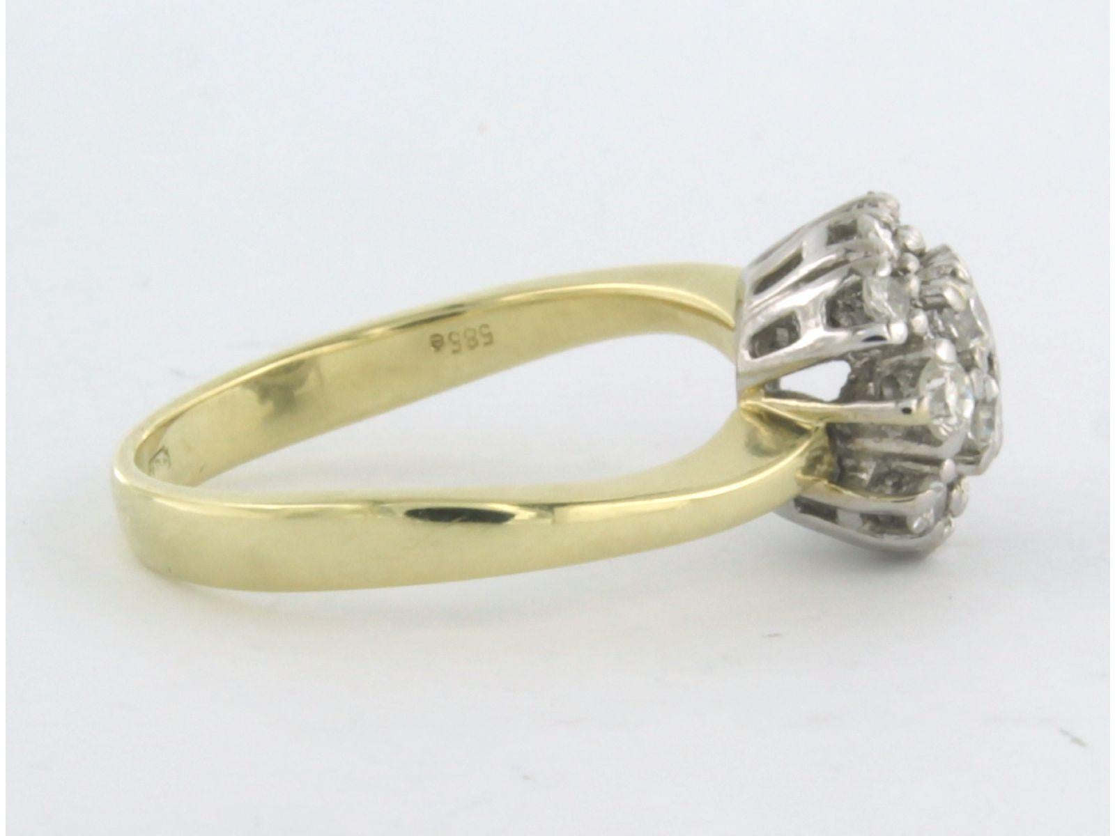 14k bicolor gold ring set with brilliant cut diamonds up to 0.66ct - F/G - VS/Si - ring size US 7.25 - EU 17.5 (55)

detailed description:

The top of the ring is 1.0 cm wide

weight: 4.4 grams

ring size US 7.25 - EU 17.5 (55), ring can be enlarged