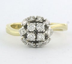 Ring with brilliant cut diamonds up to 0.66ct 4.4 grams 14k bicolour gold