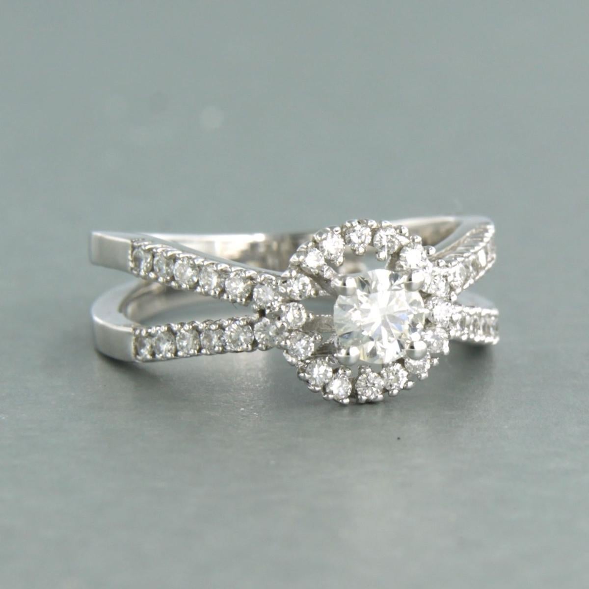 Brilliant Cut Ring with brilliant cut diamonds up to 0.71ct 14k white gold For Sale