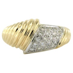 Ring with brilliant cut diamonds upt to 0.35ct 18k bicolour gold