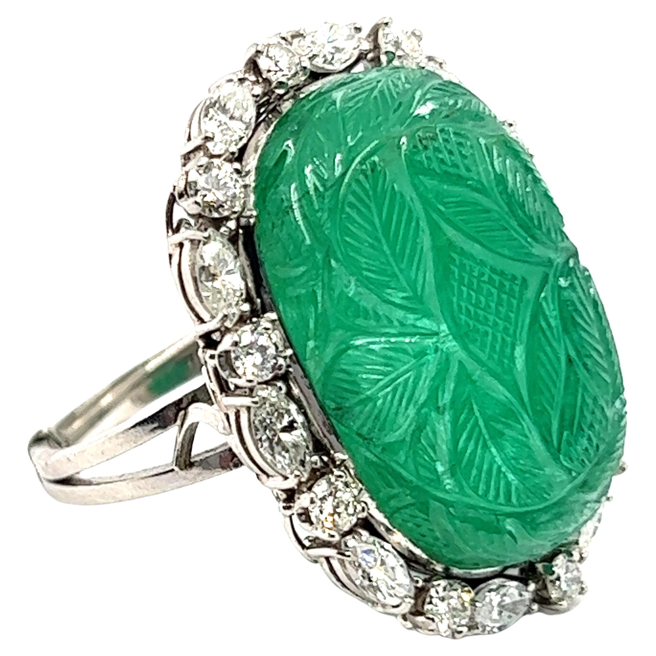 Ring with Carved Emerald and Diamonds in 950 Platinum For Sale