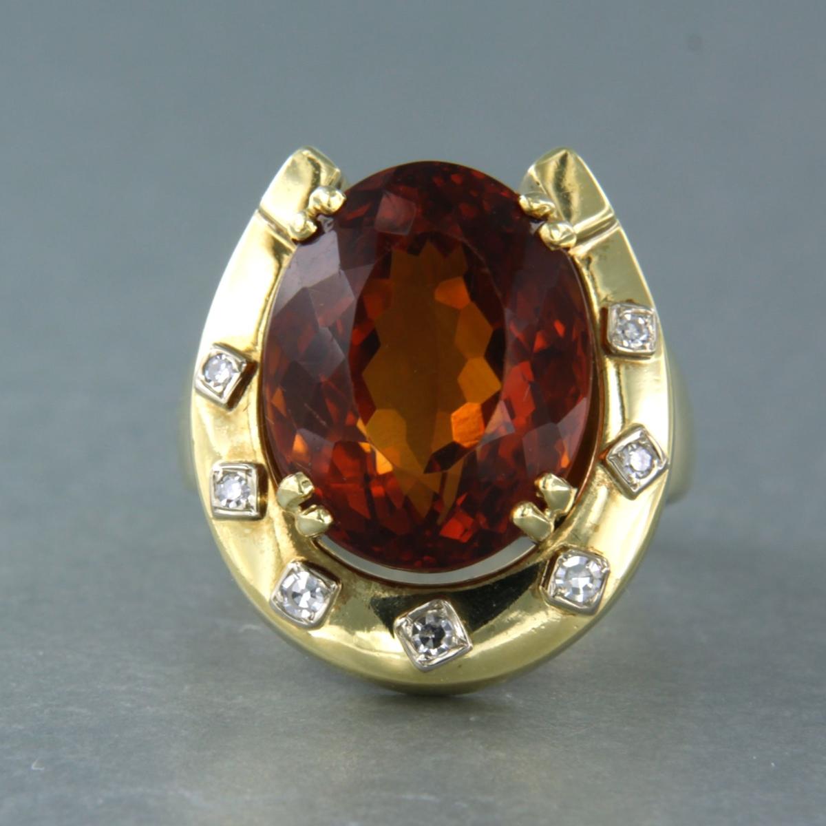 18k yellow gold ring set with citrine and single cut diamond 0.20 ct F/G-VS/SI, ring size U.S. 7.25 - EU. 17.5 (55)

detailed description:

The top of the ring is 2.1 cm wide

weight 11.8 grams,

ring size US 7.25 - EU. 17.5 (55), ring can be