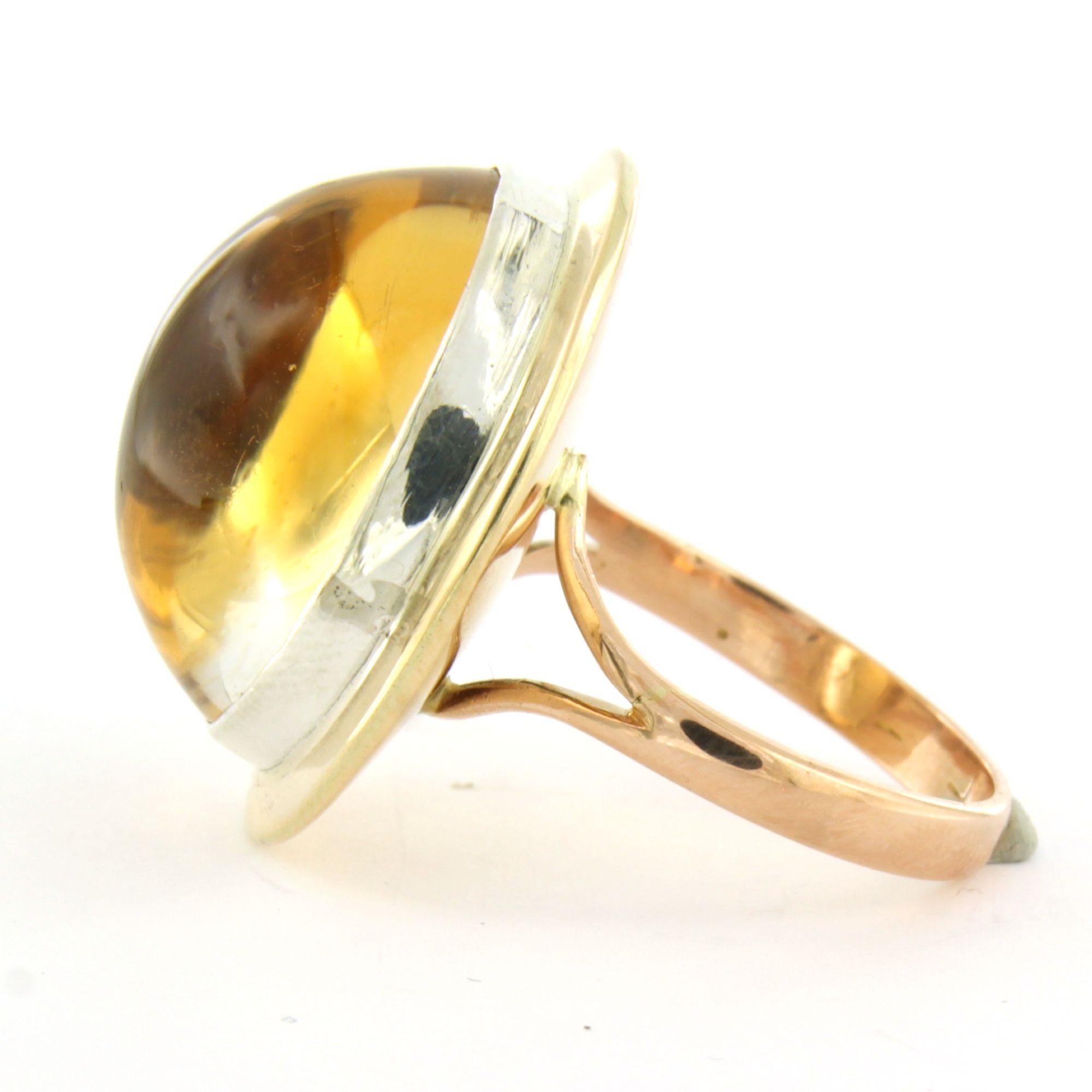 14k pink gold and silver ring set with citrine – 13.0 grams – ring size US 10 – EU 19.75 (62)

Detailed description:

The top of the ring is oval, 2.7 cm by 2.4 cm wide and 1.3 cm high.

Ring size US 10 – EU 19.75 (6). The ring can be resized a few