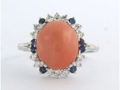 Ring with coral, sapphire and brilliant cut diamonds up to 0.40ct 18k gold