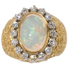 Ring with Crystal Opal Cabochon and Diamonds, 14 Karat Gold