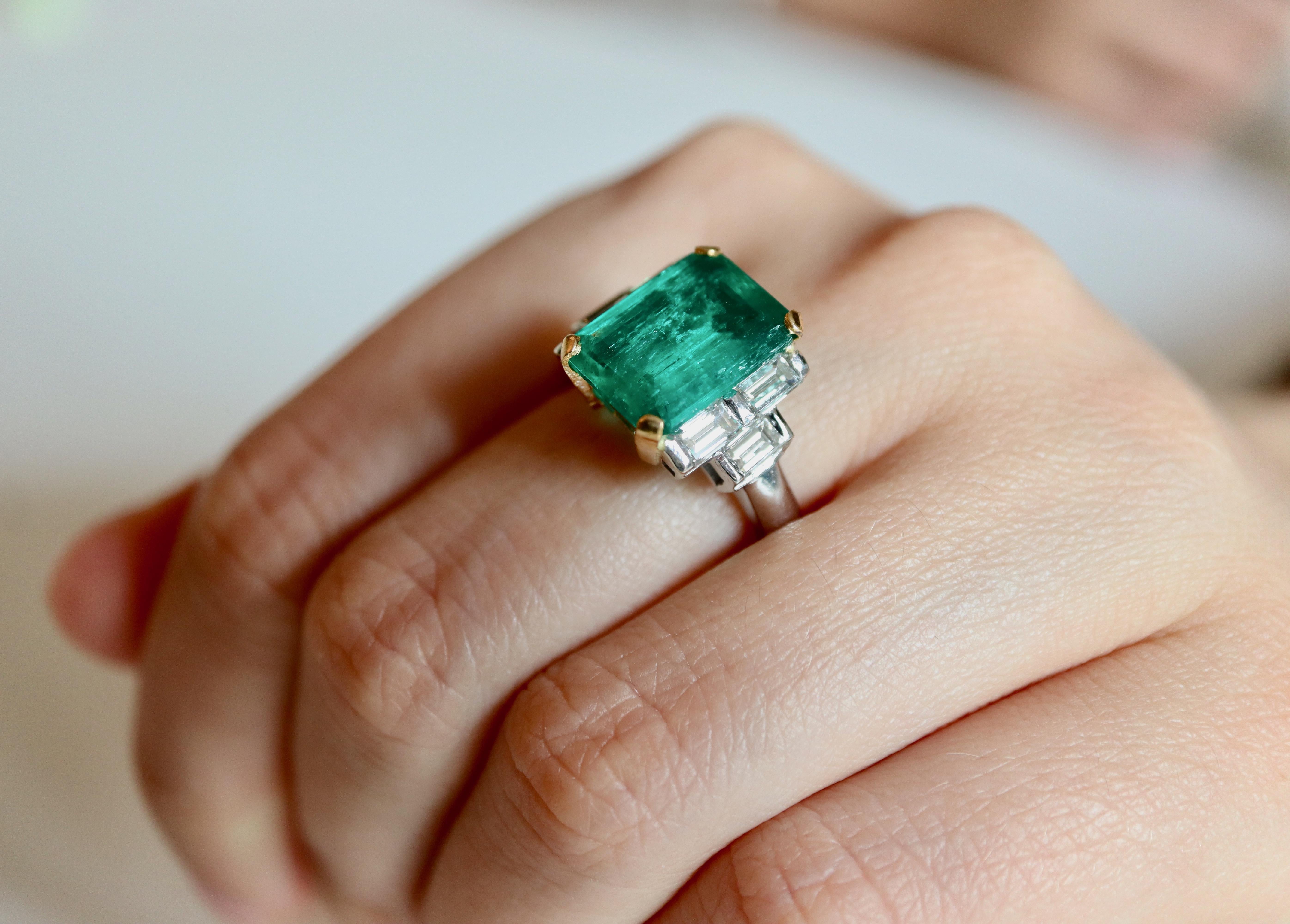 18-karat yellow and white gold diamond and emerald ring 3.71 carats
Ring in 18-carat white gold, basket in 18-carat yellow gold holding in its center a large prong-set emerald-cut emerald weighing 3.71 carats. The 18-carat white gold setting is set