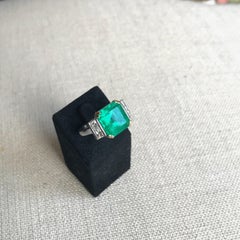 Ring with Emerald 5.95 Carats and 18 Carat White Gold with Diamonds