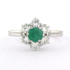 Anello con smeraldo e diamanti taglio brillante fino a 0,90ct in oro 14k 2,9 grammi