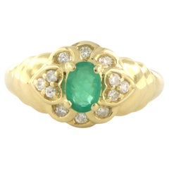 Anillo con diamantes talla esmeralda y brillante hasta 0,20ct Oro amarillo de 18k 3,7 gr