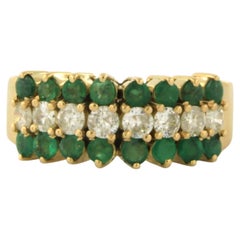 Ring with emerald and brilliant cut diamonds up to 0.48ct 18k gold 7.2 grams