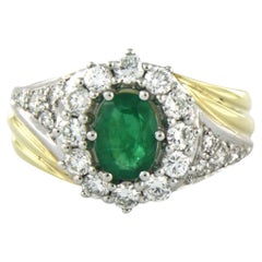 Anello con smeraldo e diamanti taglio brillante fino a 0,92ct in oro 14k bicolore