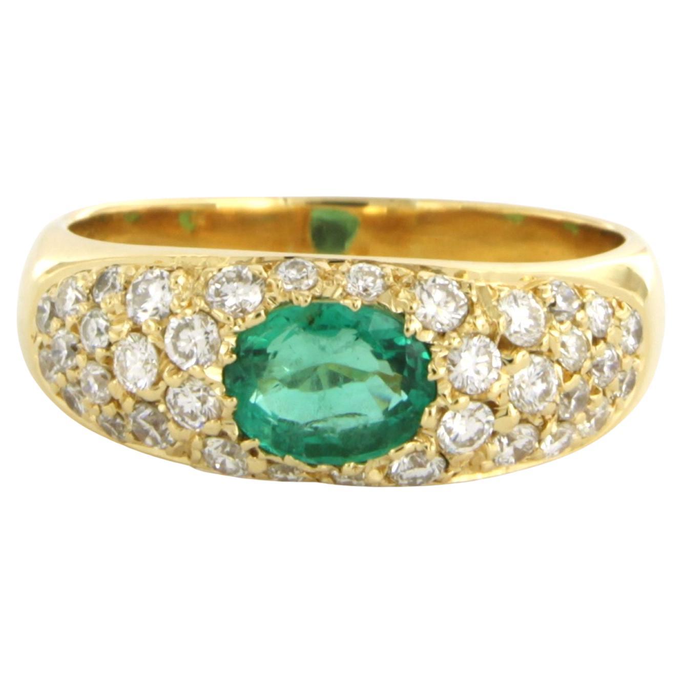 Ring with emerald and diamonds 14k yellow gold