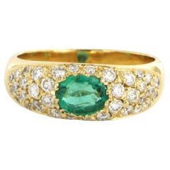 Ring with emerald and diamonds 14k yellow gold