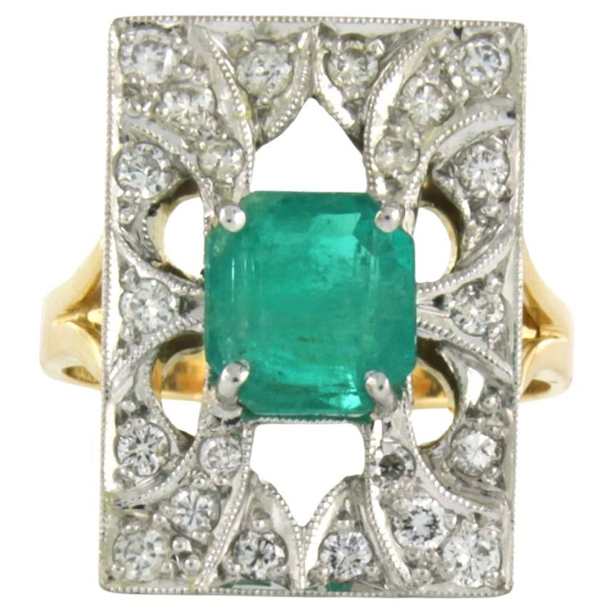 Ring with emerald and diamonds 18k bicolour gold 