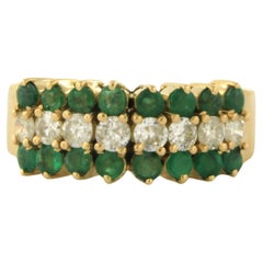Ring with emerald and diamonds 18k yellow gold