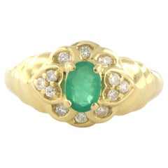 Ring with emerald and diamonds 18k yellow gold