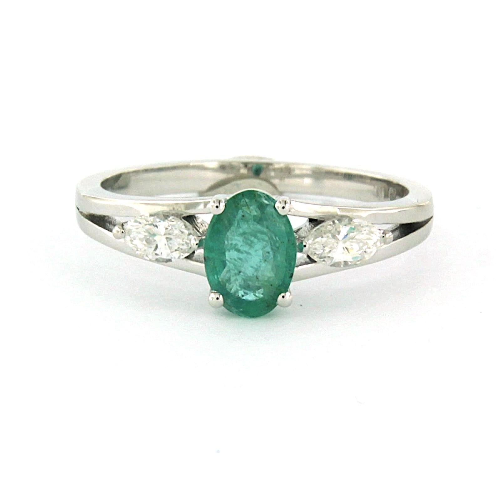 Ring with emerald and marquise shaped diamonds up to 0.32ct 18k gold 4.7 grams For Sale