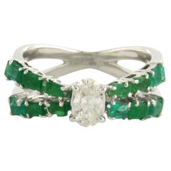 Ring with emerald and oval cut diamond up to 0.50ct 18k gold 5.5 grams