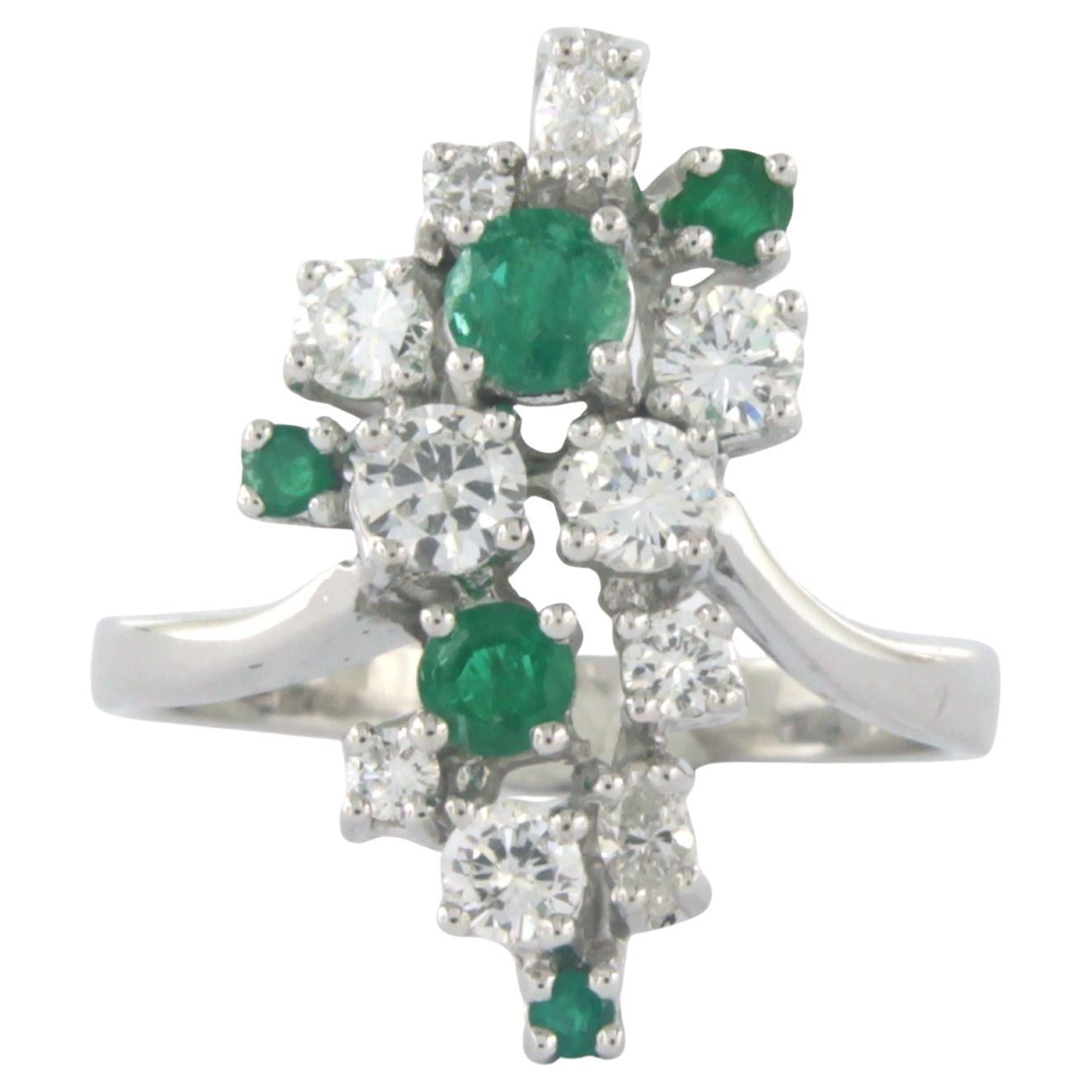 Ring with emerald, brilliant and marquis cut diamond up to 0.85ct 14k white gold